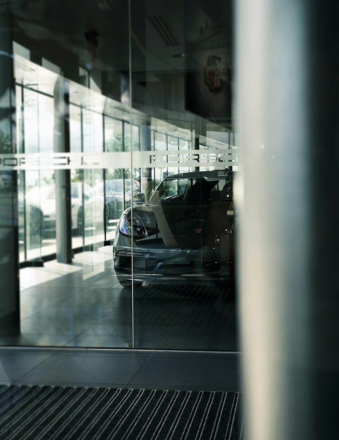 Modern car showroom interior with glass facade