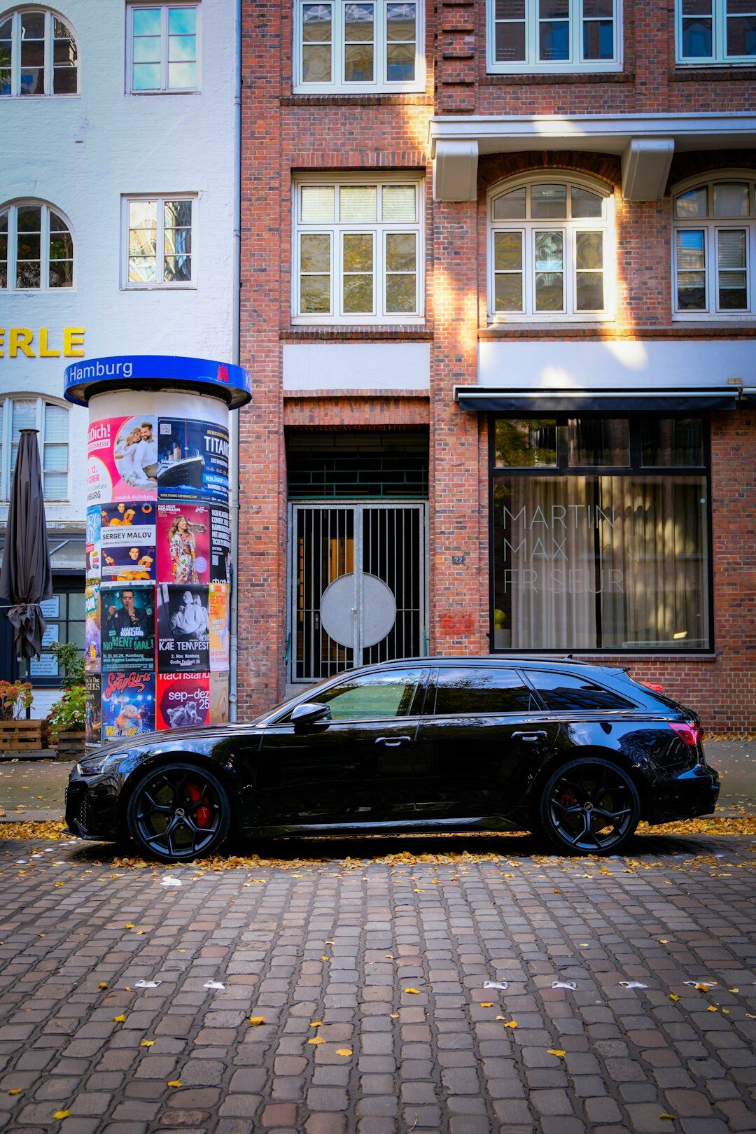 European premium station wagon on a cobblestone street