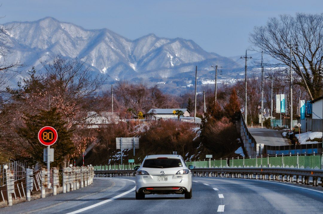 electric car driving on highway